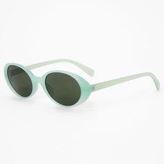 Mint green is so trendy, and perfect for these stylish shades! Protect those pretty eyes with these lightweight sunglasses, so slim and so sleek. Lens Color: Smoke Frame Color: Mint Frame Type: Round Dimensions: 6" W x 1.5" H Material: Plastic - Claire's Mint Green Round Sunglasses Casual Green Sunglasses For The Beach, Casual Green Sunglasses For Beach, Green Mirrored Lenses Cat Eye Sunglasses, Modern Green Sunglasses For Summer, Modern Green Summer Sunglasses, Trendy Green Tinted Cat Eye Sunglasses, Chic Green Sunglasses For Spring, Green Sunglasses For Spring Beach Outings, Green Sunglasses With Uva Protection For Spring