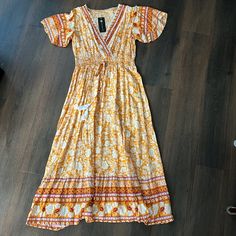 This Cute Boho Dress Is Just What You Need For The Spring. Pair It With Some Sneakers Or Sandals And You’ll Be Ready To Hit The Town! Questions? Leave A Comment Below! Boho Butterfly, Kate Dress, Tassel Dress, Butterfly Sleeve, Butterfly Sleeves, Linen Dresses, Boho Dress, Red Yellow, Maxi Dress