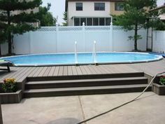 an above ground pool with steps leading up to it