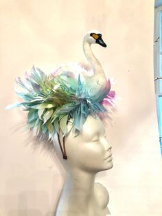 "Bird Fascinator- Horse Racing - Feather Headband- Swan Lake- Derby- Swan Headpiece- Halloween costume. Hello, It's perfect to add whimsical fun to any occasion. You'll be the life of the party with this great conversation piece This Fascinator has been featured in the New York Times, on Martha Stewart's blog and has won several hat contests! He also was also featured on Kathy Lee Gifford while she covered at Megan Markel's wedding in London! This has swan that is 10\" high with a matching puff Whimsical Headband For Carnival, Whimsical Headpieces With Matching Headband For Costume Party, Fitted Multicolor Headband Headpiece, Fitted Multicolor Headband, Whimsical Fitted Headband Fascinator, Whimsical Headband For Royal Ascot, Whimsical Headband For Costume Party, Whimsical Headband For Kentucky Derby, Whimsical Headband Costume Hats For Party