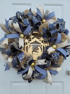 a blue and white wreath with an animal on it