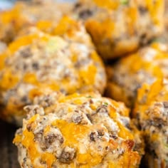 cheeseburger muffins stacked on top of each other with meat and cheese