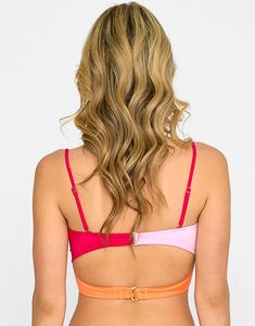 The Bri Bandeau Top is a stylish and functional way to enjoy your summer days, with its eye-catching cutout and twist details. Look chic and fashionable this summer with the sunset hibiscus colorblock. S-hook back closure Adjustable/removable straps Models are wearing a size S Content: 80% Polyamide / 20% Elastane *Bright colors may transfer onto lighter colors and fade with prolonged exposure to sunlight. Hand wash color separately as colors may run. Color Block Swimwear For Sunbathing In Spring, Color Block Beachwear Swimwear For Spring, Trendy Color Block Swimwear For Summer, Orange Color Block Swimwear For Vacation, Pink Color Block Swimwear For Summer, Orange Color Block Swimwear For Summer, Chic Pink Swimwear With Adjustable Straps, Trendy Color Block Swimwear For Vacation, Trendy Color Block Swimwear For Spring