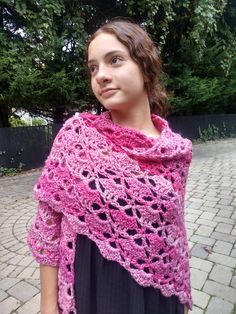 You can see the beauty of this lovely, crocheted piece.  There is a soft and elegant pattern throughout, that enhances the drape and makes this piece quite stunning.  The variegated yarn includes several different shades of pink from deep vibrant pink to a softer light pink.  As you can see, it's very adjustable.  Each version is lovely.  I can also purchase shawl pins (featured in another listing) which add to the beauty of this piece.   This shawl was made in a smoke and dander free environmen Pink Crochet Patterns In Yarn, Pink Crochet Knitting Pattern, Pink Shawl, Different Shades Of Pink, Variegated Yarn, Shawl Pins, Women Shawl, Shawls And Wraps, Soft Lighting