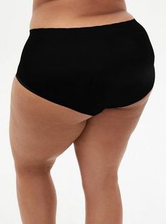 FIT Mid rise. Full coverage. MATERIALS + CARE Seamless knit fabric. 95% nylon, 5% spandex. Wash cold. Dry low. Imported. DETAILS Elastic waistband. WHY WE LOVE IT Soft and seamless, this brief panty stretches with you while disappearing under your most slim-fitting looks. The best plus size women's seamless smooth mid-rise brief panty sleep bottoms in black made of seamless. These comfy pajamas will be your favorite PJs to sleep in or lounge around. Seamless High Stretch Short Bottoms, Black High Stretch Bottoms With Wide Waistband, Solid Color Stretch Shapewear Bottoms, Black Smoothing Short Length Bottoms, Black Smoothing Short-length Bottoms, High Stretch Seamless Short Bottoms, High Stretch Seamless Fabric Short Bottoms, Black Stretch Smoothing Bottoms, Stretch Smoothing Black Bottoms