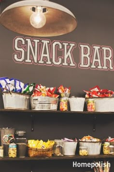 the snack bar is stocked with snacks and condiments