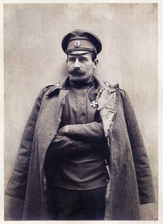 Imperial Russian Army - Evgeny Gusev pioneer of armored combat use. Note oval cap badge and asymmetric `peasant shirt`style. Medal may be the  Order of St. George. Good example of winter overcoat. WW1. Deco Punk, Winter Overcoat, Peasant Shirt, Chinese History