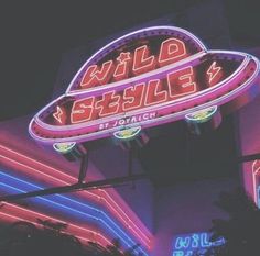 a neon sign that says wild seaside in spanish