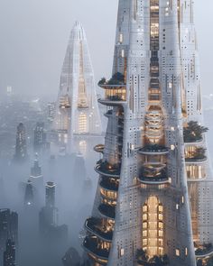 an aerial view of skyscrapers in the foggy city with lights shining on them