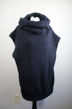 --Topshop black chunky rib knit cowl neck sleeveless sweater. --Size 12 (EU 44, UK 16). Measurements (lying flat): Bust (pit to pit): 25" Length (back of neck to hem): 29" Chunky Cowls, Knit Cowl, Cowl Neck Sweater, Sleeveless Sweater, Cowl Neck, Alpaca, Rib Knit, Topshop, Size 12