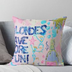 a pink pillow with the words ladies love are fun on it sitting on a couch