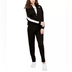 Head To The Game, The Gym And Beyond In This Tracksuit, Jacket And Joggers From Puma, With The Jacket Conveniently Zippered Up The Front. Imported Ribbed Stand Collar; Front Zipper Closure; Side Stripes At Sleeves. Polyester - Pocket Bag: Cotton; - Rib: Cotton/Elastane Machine Washable Approximate Measurements Laid Flat Jacket - Shoulder To Hem 24” - Underarm To Underarm 24” Pants - Length 40” - Inseam 27” - Rise 14” - Leg Open 11” 203 Puma Tracksuit 2-Piece Jacket Joggers Unisex Xl Black Sporty Track Jacket For Loungewear, Sporty Black Track Jacket For Loungewear, Black Sporty Track Jacket, Puma Tracksuit, Sports Pants Women, Black Sweats, Jersey Jacket, Tracksuit Jacket, Fitted Joggers