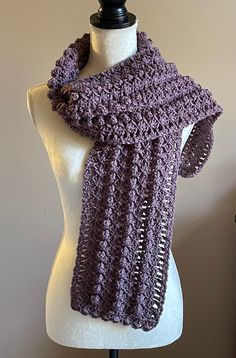 Handmade winter scarf crocheted in beautiful French lilac purple.  This textured design features alternating eye-catching shells and popcorn stitches stacked into vertical columns.  Made with incredibly soft anti pilling acrylic fibers, measuring 60" long, 7" wide, and about 1/4" thick with an accent of scalloped edging on each end.  This listing is for the scarf only.  The matching hat can be found here https://showurstyledesigns.etsy.com/listing/1307391375 Hand washing and air drying is recommended and will keep your hand made item long lasting.  These anti pilling fibers will keep your item looking like new wash after wash.  Items can be machine washed on gentle cycle in cold water and machine dried on low heat.  If you choose to do so, please take care to protect your item in a delicat Purple Scarf, French Lilac, Popcorn Stitch, Acrylic Fiber, Purple Scarves, Christmas Baskets, Crochet Scarves, Crochet Shawl, Winter Scarf