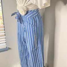 American Eagle Blue High Rise Paper Bag Waist Striped Wide Leg Pants 4 Regular 100% Cotton Waist 15.5” Rise 11” Hips 20” Inseam 29.5” Smoke Free Home!! # 331” #12 Spring Striped Bottoms With Pockets, Striped Spring Bottoms With Pockets, Vacation Wide Leg Capris With Pockets, Casual Blue Bottoms With Belt Loops, Trendy Cotton Bottoms With Tie Waist, Casual Blue Pants With Belt Loops, Blue Beach Pants For Spring, Cotton Paperbag Waist Bottoms With Tie, Cotton Bottoms With Tie And Paperbag Waist