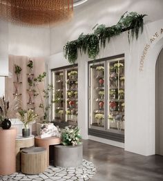 the interior of a flower shop with potted plants