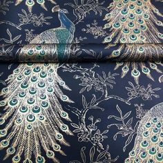 peacocks and flowers on blue fabric with gold foil