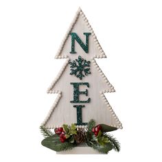 a christmas tree made out of wood with the word noel spelled in green and white