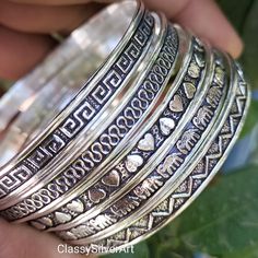 Welcome To My Shop CLASSYSILVERART Set of 5 Bangles, 925 Sterling Silver Bangle, Stacking Bangle, Semanario Bangle, Stacking Bracelets, 5 Day Bangles, Boho Bracelet Handmade Jewelry Solid Sterling Silver Beautiful Bangles. It is perfect gift for all , someone you love most. This Bangle is a unique gift for men and women. Beautifully Handcrafted with Precision to given you a unique piece of jewelry for lifetime. https://www.etsy.com/your/shops/CLASSYSILVERART/tools/listings/1628334516/copy Thanks & Regard's Bohemian Stamped 925 Bracelet Gift, Spiritual Silver Bangle For Anniversary, Silver Bohemian Bracelets For Anniversary, Bohemian Round Bracelets For Anniversary, Silver Spiritual Bracelets For Anniversary, Symbolic Silver Bracelet For Anniversary, Spiritual Silver Etched Bracelet, Spiritual Etched Silver Bracelet, Bangle Stacking