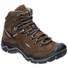 A boot that delivers durable support and traction over rough terrain, the KEEN\u00ae Durand II Mid Waterproof Hiking Boots for Men help you explore farther. Premium, waterproof nubuck leather uppers with KEEN.DRY waterproof/breathable membrane technology inside keep feet dry, supported, and protected. Breathable mesh linings allow air movement around the feet, while the boot's natural probiotic odor-resistant technology help keep feet feeling fresh. Stability shanks and contoured heel locks prov Reinforced Toe Hiking Boots For Climbing, Hiking Boots With Reinforced Toe For Climbing, Gore-tex Hiking Boots For Outdoor Work, Rugged Waterproof Boots With Round Toe For Climbing, Rugged Lace-up Hiking Boots With Protective Feet, Leather Waterproof Boots With Reinforced Toe For Climbing, Rugged Hiking Boots With Foot Protection For Sports, Climbing Boots With Vibram Sole And Round Toe, Waterproof Leather Hiking Boots For Climbing