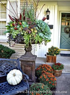 fall front porch decor with pumpkins and flowers