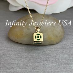 "The pendant pictured is an asscher cut lab created emerald with genuine diamond accents #6338 -Approximate total carat weight: 1.80ctw diamond equivalent -Center Stone Size: 7x7mm - approx. 1.75ct diamond equivalent -Center Stone Shape: Asscher Cut -Gem Type: lab created emerald -Stone Clarity: VS2 -Stone Color: Green -Moh's Scale: 8.5 hardness -Side Stones Size: approx. 0.03ct. diamond equivalent -Gem Type: genuine diamond -Stone Clarity: SI -Stone Color: G -Moh's Scale: 10 hardness -Metal Typ Asscher Cut Diamond Jewelry As Gift, Emerald Cut Jewelry With Polished Finish As Gift, Fine Jewelry Necklace With Asscher Cut For Gift, Fine Jewelry Asscher Cut Necklace For Gift, Fine Jewelry Asscher Cut Gift, Gia Certified Octagon May Birthstone Jewelry, Asscher Cut Yellow Gold Jewelry Gift, Asscher Cut White Gold Jewelry Gift, Rectangular 14k Stamped Diamond Jewelry