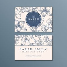 two business cards with flowers on them, one is blue and the other is white