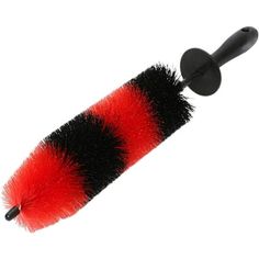 a red and black brush on a white background