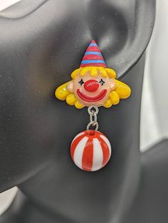 Red clown earrings, clown jewellery, clown lover gifts, novelty earrings, stud earrings, fun earrings, circus earrings, circus themed, Materials * 40mm red dangly clown charm * Sterling silver studs * light weight * rubber stoppers for back of earrings We purchase high quality materials through u.k. based business and also through china Postage * All UK items are sent standard royal mail unless tracking is choose at check out * All abroad items are sent standard delivery unless tracked is choose Playful Red Drop Earrings, Fun Red Round Jewelry, Playful Red Pierced Earrings, Playful Red Dangle Jewelry, Playful Red Earrings For Pierced Ears, Playful Nickel-free Red Earrings, Playful Handmade Red Earrings, Fun Dangle Earrings, Clowncore Wallpaper