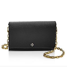 Textured Leather Wallet On A Delicate Goldtone Shoulder Chain. Top Flap With Snap Closure Goldtone Hardware 2 Interior Compartments Interior Zip Pocket Interior Bill Slot 6 Interior Card Slots Lined Leather Trim: Polyurethane Coating: Polyurethane Imported Size Removable Crossbody Strap, 22.5" Drop 7.75"W X 5"H Formal Black Wallet On Chain With Magnetic Closure, Black Luxury Wallet On Chain With Magnetic Closure, Luxury Black Wallet On Chain With Magnetic Closure, Elegant Tan Wallet On Chain With Gold-tone Hardware, Luxury Tan Wallet On Chain For Formal Occasions, Classic Tan Wallet On Chain For Formal Occasions, Formal Black Wallet On Chain With Removable Pouch, Elegant Tan Evening Wallet, Formal Black Wallet On Chain