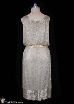 Norman Norell dress glass beaded sleeveless tank dress | Etsy Champagne Sleeveless Sequin Dress For Gala, Sleeveless Champagne Sequin Dress For Gala, Champagne Sequined Sleeveless Evening Dress, Glamorous Sleeveless Flapper Dress For Formal Occasions, Gatsby Style Sleeveless Gala Evening Dress, Gatsby Style Sleeveless Embellished Evening Dress, Champagne Sleeveless Sequin Dress For Wedding, Sleeveless Champagne Sequin Dress For Wedding, Elegant Gold Flapper Dress For Formal Occasions