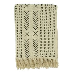 a beige and black blanket with arrows on it