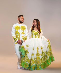 Description Celebrate love in style with our "Harmony in Hues" - a lively Ethiopian couples outfit intricately handwoven from the exquisite Menen fabric. This modern Habesha couples ensemble features a vibrant yellow and green design, creating a visual symphony that beautifully blends tradition and contemporary fashion. Adorn yourselves in the rich threads that tell a tale of craftsmanship and cultural pride, making this handwoven ensemble a true celebration of Ethiopian heritage. Step into the White Traditional Wear For Summer Wedding, Traditional Summer Celebration Sets, Traditional Celebration Sets For Summer, Multicolor Traditional Wear For Spring Wedding, Green Bohemian Sets For Traditional Ceremonies, Traditional Wedding Dresses Matching Set, Traditional Wedding Dress With Matching Set, Bohemian Long Sleeve Sets For Wedding, Bohemian Long Sleeve Wedding Sets