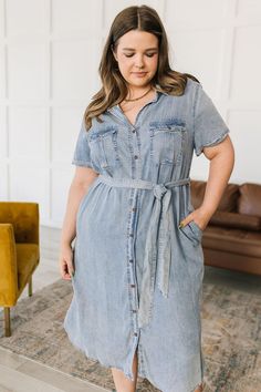 Introducing the Hazel Blues® | Wait For It Denim Shirtdress! This stylish chambray dress has it all, from a button front and self-tie belt for a timeless yet flattering look, to 100% Tencel for a comfy and breathable fit. Plus, it's true to size and available in lots of colors - what are you waiting for? S: Chest 40" Hip 44" Length 42"M: Chest 43" Hip 46" Length 42"L: Chest 45" Hip 48" Length 42"1XL: Chest 51" Hip 54" Length 45"2XL: Chest 52" Hip 56" Length 45"3XL: Chest 54" Hip 58" Length 45" M Light Wash Chambray Button-up Denim Dress, Button-up Chambray Dress In Medium Wash, Light Wash Button-up Dress For Work, Short Sleeve Denim Shirt Dress For Daywear, Light Wash Button-up Work Dress, Medium Wash Belted Button-up Dress, Belted Button-up Denim Dress, Chambray Denim Dress For Daywear, Chambray Button-up Denim Dress For Workwear