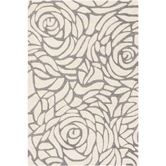 a rug with roses on it in grey and white colors, as well as an area rug for the floor