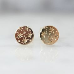 Why I Love It: Dainty diamond discs perfect for everyday wear with hand engraved celestial detailing and crafted in your choice of golds. These are the perfect treat yourself gift! The Details: Available in 14k Yellow Gold, 14k White Gold, 14k Rose Gold Diameter is Approx. 6.35 mm For Small 8.00 mm for Medium Made to order, please allow approximately 4 weeks for delivery What You Need To Know: Have more questions? Perhaps our FAQ page will help! 14k Gold Round Celestial Earrings, 14k Gold Celestial Round Earrings, 14k Gold Celestial Earrings, Everyday Celestial Round Earrings, Orion Star, Star Celestial, Engraved Earrings, Stacked Wedding Rings, Sapphire Wedding Rings