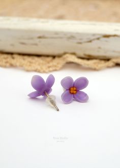 Tiny lilac stud earrings.Diameter of flowers is about 1,2 cm (0.5 in).They are handmade, without using a mold, so the size may vary a little.  #Lilac #StudEarrings #Purple #Flowers #PostEarrings #TinyEarrings Lavender Flower-shaped Earrings For Gifts, Adjustable Purple Flower Earrings As Gift, Adjustable Purple Flower Earrings For Gift, Purple Hypoallergenic Flower Earrings As Gift, Handmade Lavender Flower Earrings, Violet Jewelry, Small Purple Flowers, Polymer Art, Jewelry Bridesmaid