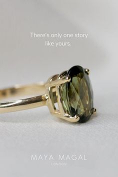 solitaire green tourmaline engagement ring handmade in 9ct gold by luxury jewellery brand maya magal based in london uk Alternative Rings, Green Tourmaline Engagement Ring, Christmas Proposal