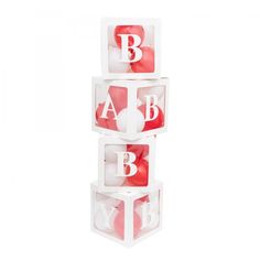 three cubes stacked up with letters and numbers on them, all in red and white