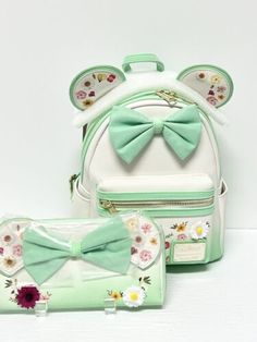 (eBay) Find many great new & used options and get the best deals for Loungefly Disney Minnie Mouse Pressed Flower Bow Mini Backpack & Wallet Set NWT at the best online prices at eBay! Free shipping for many products! Disney Style Backpack Bag For Gifts, Disney Style Backpack Bag As Gift, Green Disney Bags For Everyday Use, Cute Minnie Mouse Backpack For Daily Use, Green Disney Style Bags For Daily Use, Cute Minnie Mouse Backpack, Loungefly Purse, Disney Bags Backpacks, Random Products