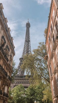 the eiffel tower towering over other tall buildings