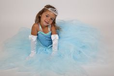 Ceremonial dress, blue princess dress, wedding tutu, little girl of honor, birthday gift, Christmas girl gift, Halloween. A beautiful dress for a beautiful day of celebration. Delivered WITHOUT tiara and WITHOUT gloves Luxury tutu dress with a large volume of tulle as for real princesses. The dress is lined on the bustier on the front with sequin fabric. It is lined under the tulle. This tutu dress is made with good quality soft tulle. The small satin straps are adaptable at the shoulders. Wash at 40o This original and artisanal creation was made in my small workshop TutusDeRêves in Provence Do not hesitate to discover in my TutusDeReves shop my other original creations of tutu dresses for the occasion you are looking for: birth, baptism, birthday, wedding, Christmas, photo shoot: https:// Princess Style Sequined Tutu Dress, Fairytale Tulle Tutu Dress For Fancy Dress, Fairytale Tulle Tutu Dress For Fancy Dress Occasions, Princess Style Pageant Dress With Tulle Skirt, Princess Style Tulle Tutu Dress For Fancy Dress, Princess Style Sequined Tulle Tutu Dress, Blue Tulle Tutu Dress For Fancy Dress, Princess Style Pageant Dress In Glitter Tulle, Light Blue Tulle Pageant Dress For Party