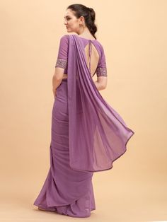 Enthralling lilac solid saree with embellished belt online for women which is crafted from georgette fabric and comes with georgette blouse. Ruffled Saree, Solid Saree, Latest Sarees Online, Latest Saree, Embellished Belt, Georgette Blouse, Net Saree, Black Chevron, Latest Sarees