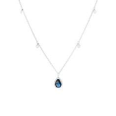 This stunning contemporary design features a pear shape sapphire weighing 0.88 carats surrounded by round brilliant cut diamonds totaling 0.12 carats. Sapphire Diamond Teardrop Pendant Necklace, Diamond Teardrop Pendant Necklace With Sapphire, Sapphire Teardrop Pendant Necklace With Diamonds, Blue Pear-shaped Diamond Necklace, Teardrop Gemstone Diamond Necklace, Teardrop Diamond Necklace With Sparkling Stones, Blue Diamond Teardrop Necklace, Teardrop Diamond Necklace With Gemstone Accents, Diamond Teardrop Necklace With Gemstone Accents