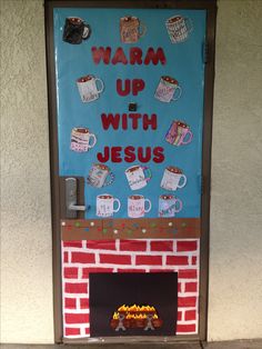 a bulletin board that says warm up with jesus and coffee mugs on the fireplace