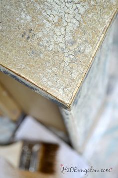 a close up view of a table with paintbrushes on it