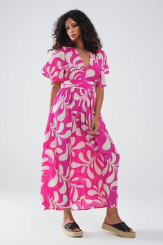 Introducing our Fuchsia Floral Print Maxi Dress with Open Back, the quintessential summer staple designed to combine comfort and style effortlessly. This lovely maxi dress features a vibrant floral print in a striking fuchsia hue, making it a standout piece for any warm-weather occasion. The angel sleeves add a touch of elegance, while the sexy open back provides a captivating and airy feel.  Crafted from 100% Polyester, this dress offers a lightweight and breathable wear, perfect for staying cool during the hottest days. The V-neck neckline enhances its flattering silhouette, and the elastic waist ensures a comfortable fit that accentuates your figure. The full-length design adds a touch of sophistication, making it suitable for both casual outings and more dressy occasions.  Our model, s Dress With Floral Print, Angel Sleeves, Dress With Open Back, Floral Print Maxi Dress, Floral Print Maxi, Summer Maxi, Summer Staples, Summer Maxi Dress, Printed Maxi Dress