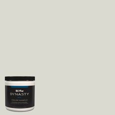 a can of dymasty paint on a gray background