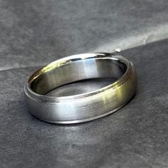 This ring is our specialty.  It is a Regular Profile ring with distinctive borders at the edges. This is a great looking ring, and is one of our most popular. The profile can be regular, more round, less round, or flat before the edge bands are added. The ring shown is 6mm wide. Photos in listings are from previous made items...every order is custom made to your specifications. Tension Setting, Titanium Rings, Tungsten Carbide, Band Rings, Custom Made, Most Popular, Jewelry Rings, Bathing Beauties