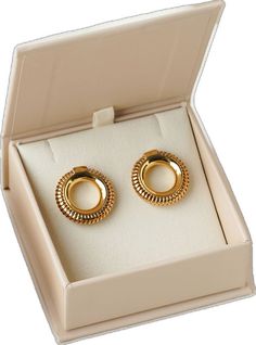 two pairs of gold toned earrings in a white gift box with the lid open to show it's inside