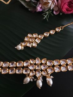 Pure and refined, this gorgeous necklace handcrafted by funcre8tions represents timeless elegance. Crafted precisely by our skilled craftsmen with beads and premium finish for a classic look. A perfect choice for simple occasions. Festive Kundan Meenakari Necklace, Kundan Necklace With Gota Work, Kundan Chandbali Necklace With Mirror Work, Diwali Kundan Necklace With Mirror Work, Kundan Necklace With Mirror Work As Gift, Festive Meenakari Kundan Pearl Necklace, Meenakari Necklace, Gorgeous Necklaces, Classic Looks